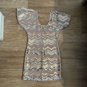Worn once. Mini sequence dress